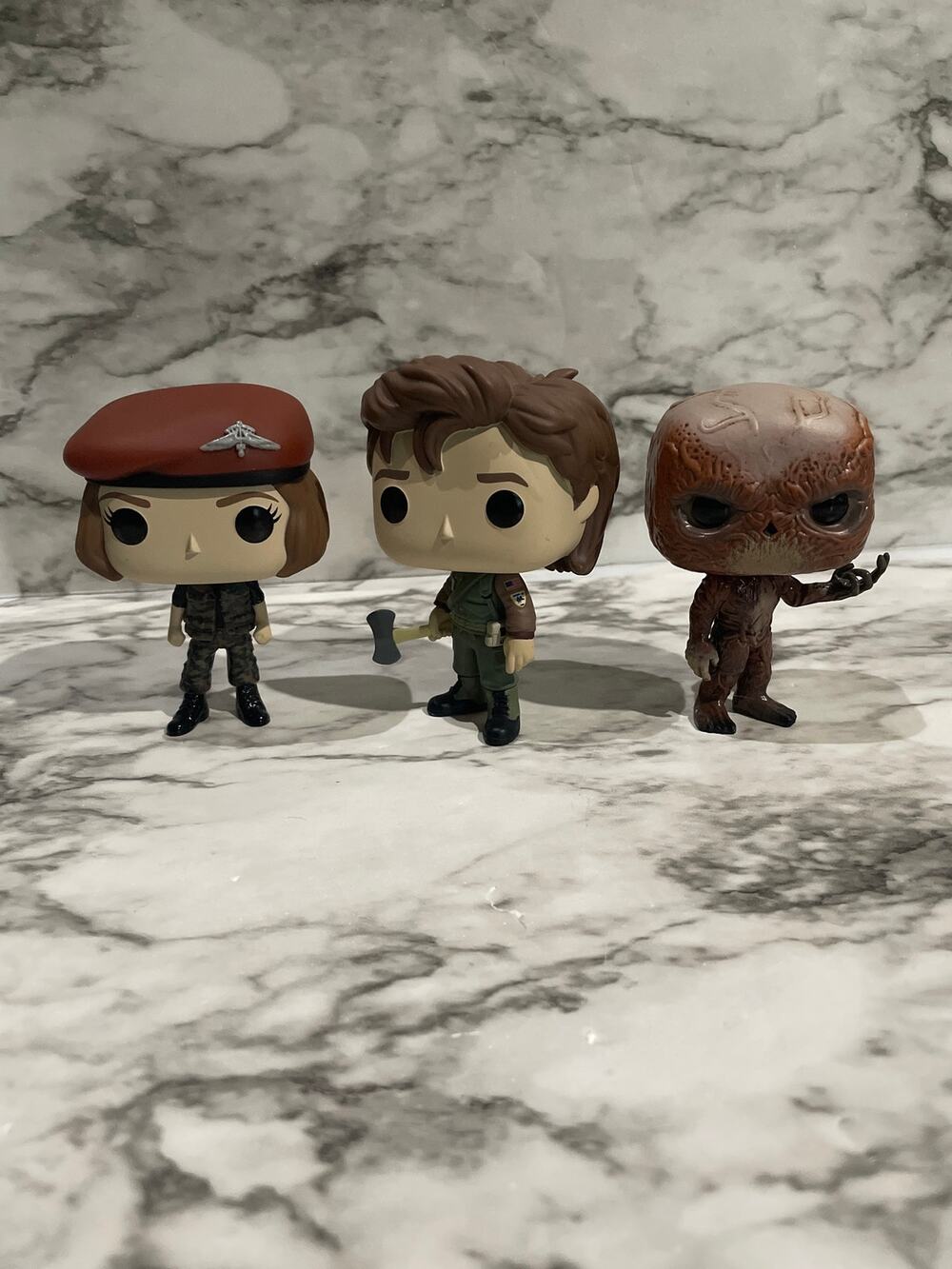 Stranger things funko pops steve, robin and vecna